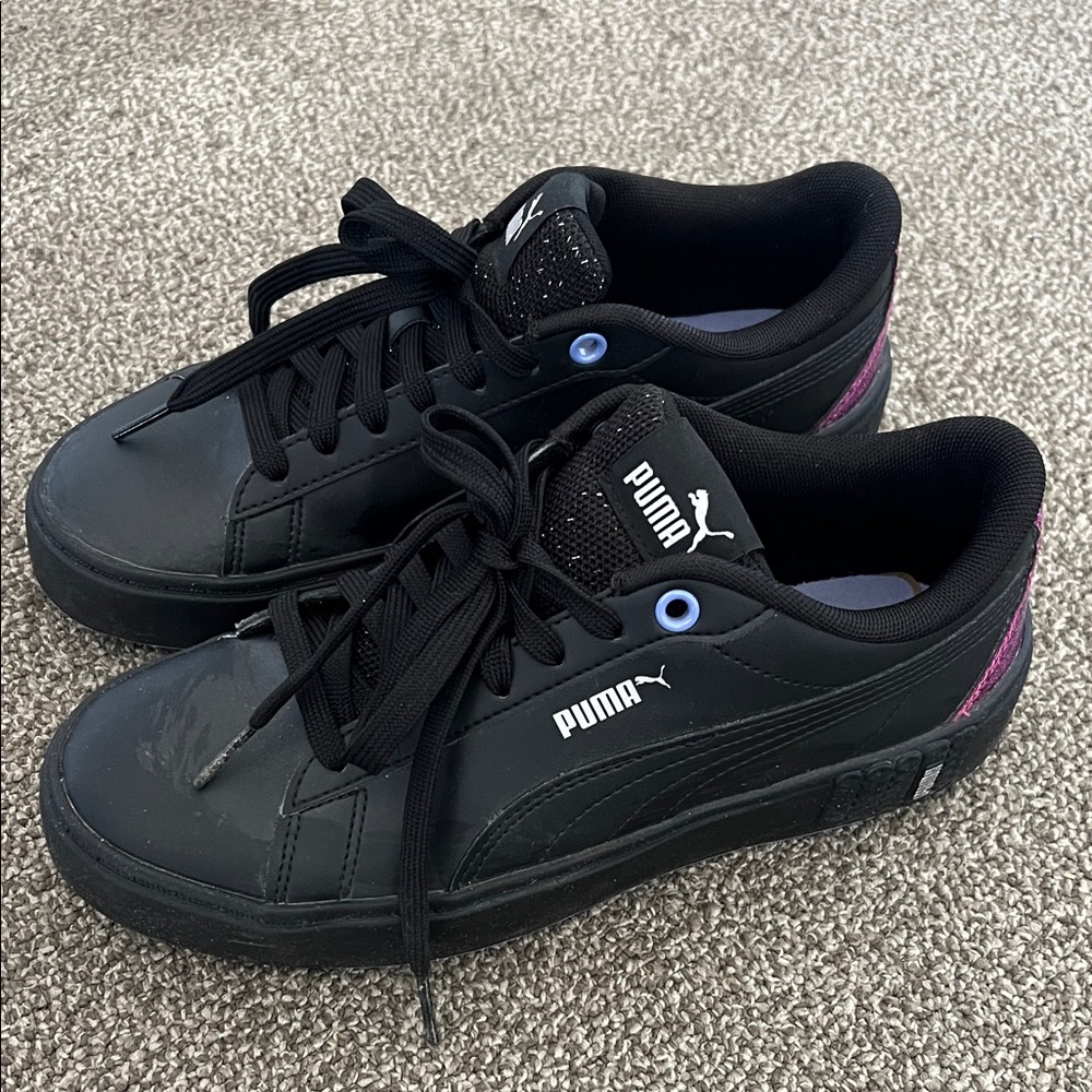 Black Puma with Purple Metallic Accents